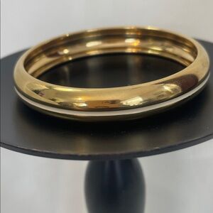 MONET Gold Tone Bangle Bracelet With Cream Enamel Stripe Around it. Size 8